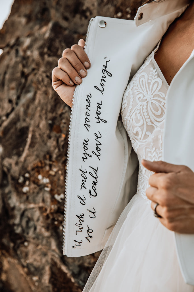 leather jacket and wedding dress 5 Ways to Make a Leather Jacket Your Perfect Wedding Accessory